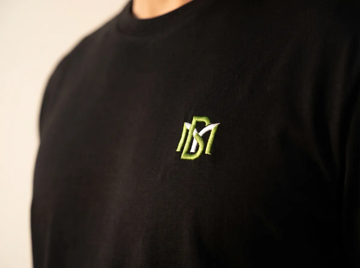 An embroidered logo on the chest