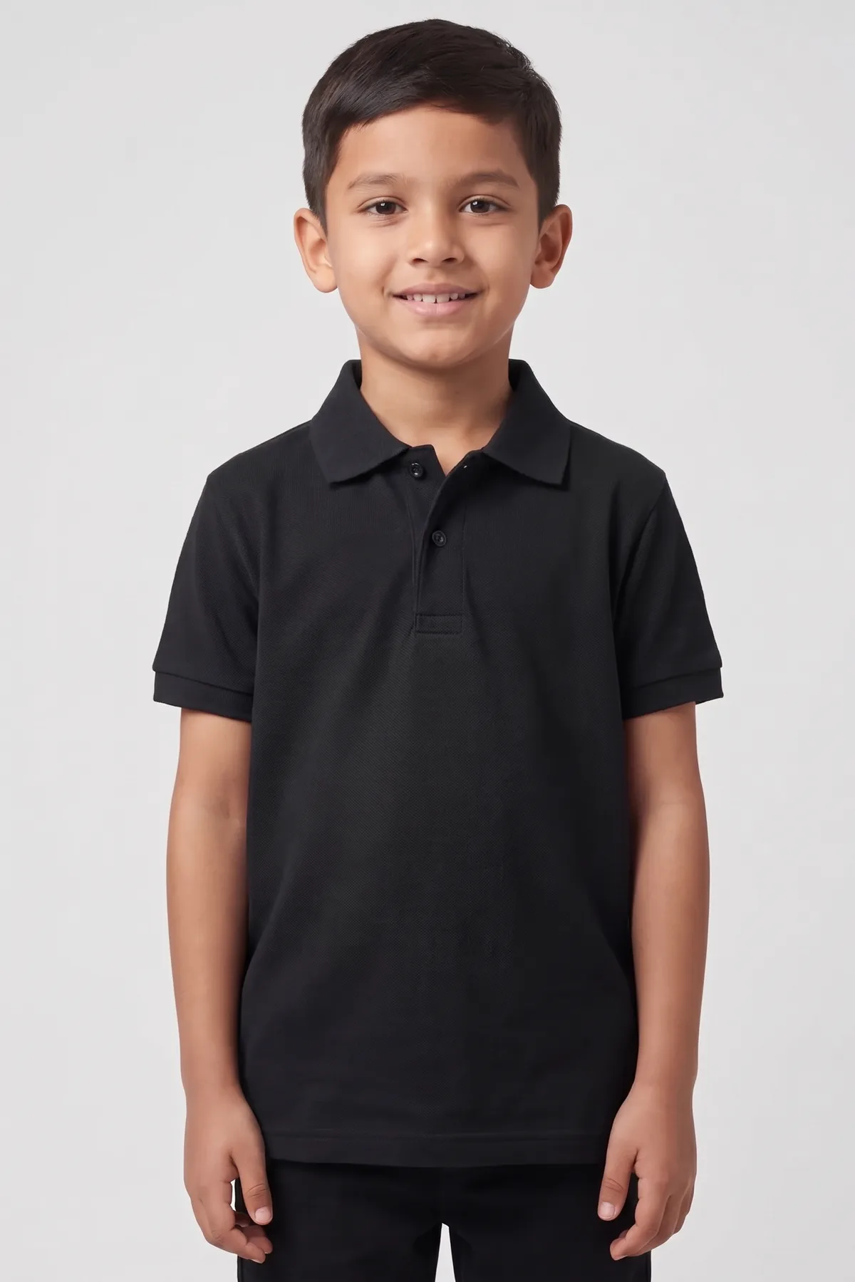 Classic Kids Polo in Black, front, on a child