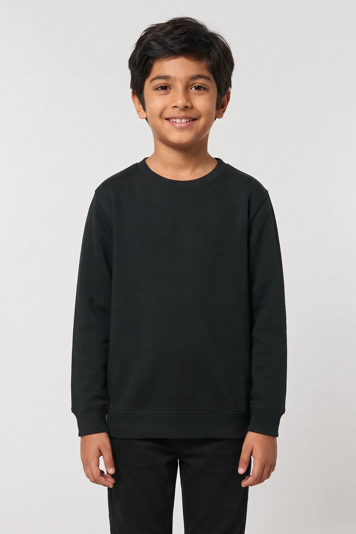 Classic Kids Sweatshirt in Black, front, on a child