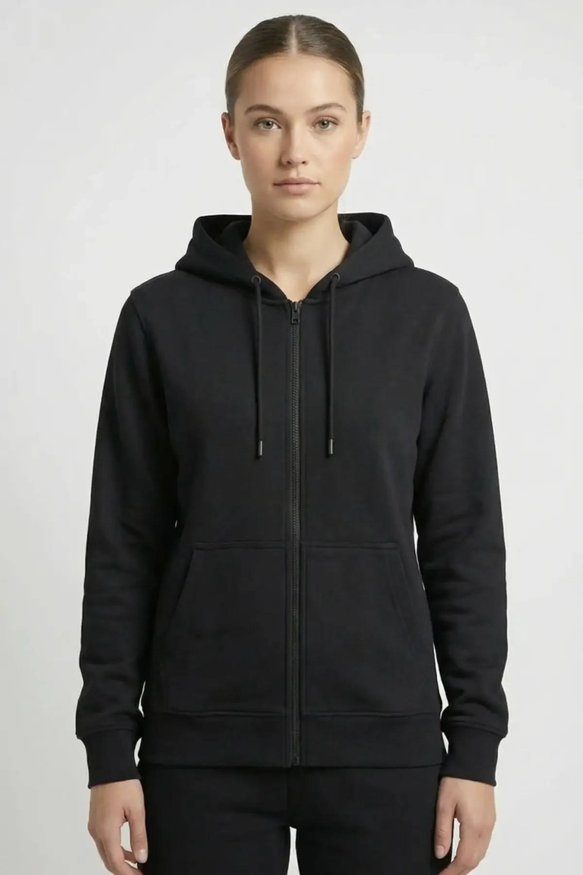 Classic Zipper Hoodie in Black, front, on a woman