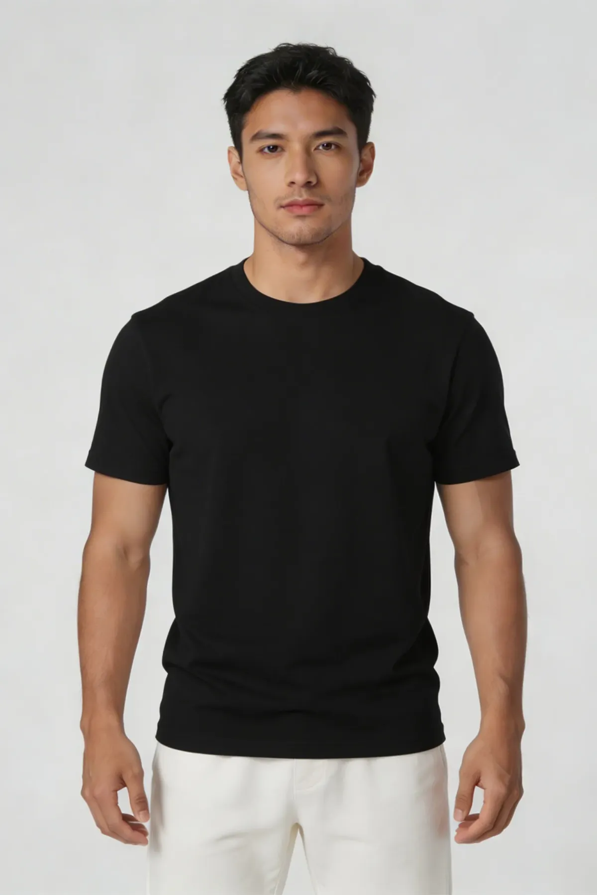 Signature Crewneck in Black, front, on a man