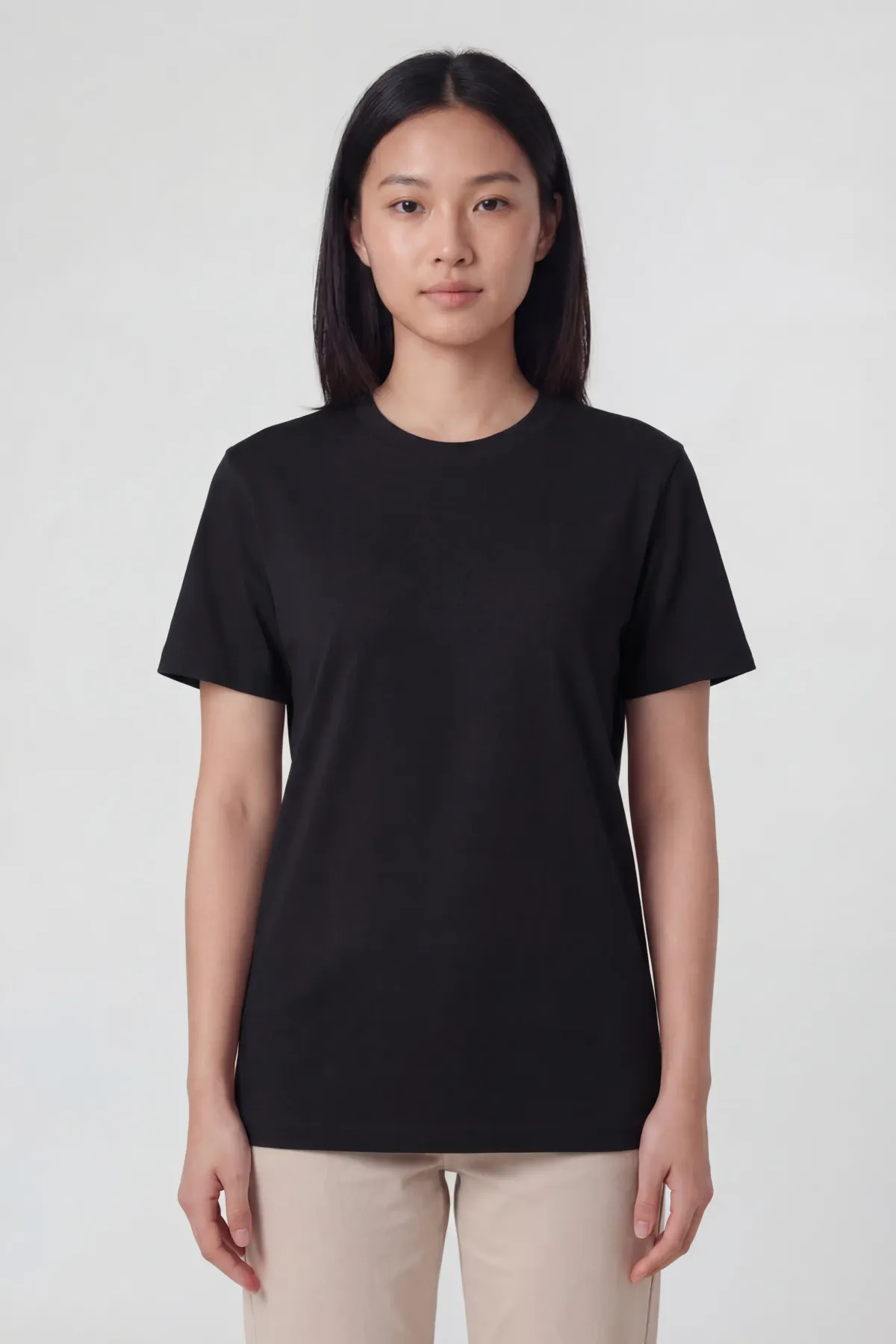 Signature Crewneck in Black, front, on a woman
